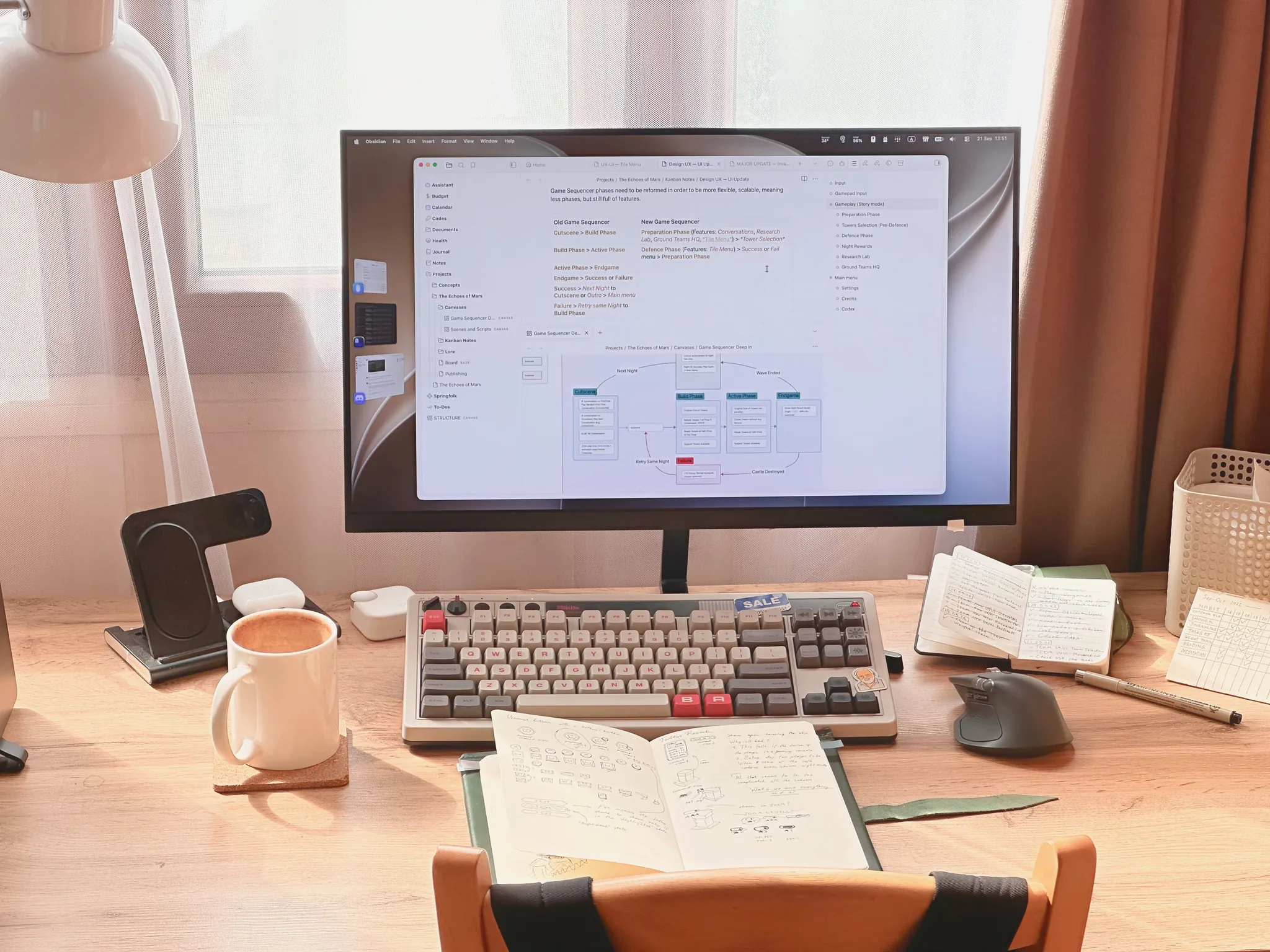 Мой рабочий стол: на мониторе схема нового секвенсора игры, рядом ретро-клавиатура, кружка кофе и открытый блокнот с набросками интерфейса.